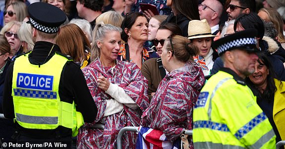 Members of the public wait for guests to arrive for the wedding of Hugh Grosvenor, the Duke of Westminster, to Olivia Henson at Chester Cathedral. Picture date: Friday June 7, 2024. PA Photo. The Duke of Westminster is godfather to the Prince of Wales' son, Prince George, and also, reportedly, to the Duke of Sussex's son Prince Archie. See PA story ROYAL Westminster. Photo credit should read: Peter Byrne/PA Wire