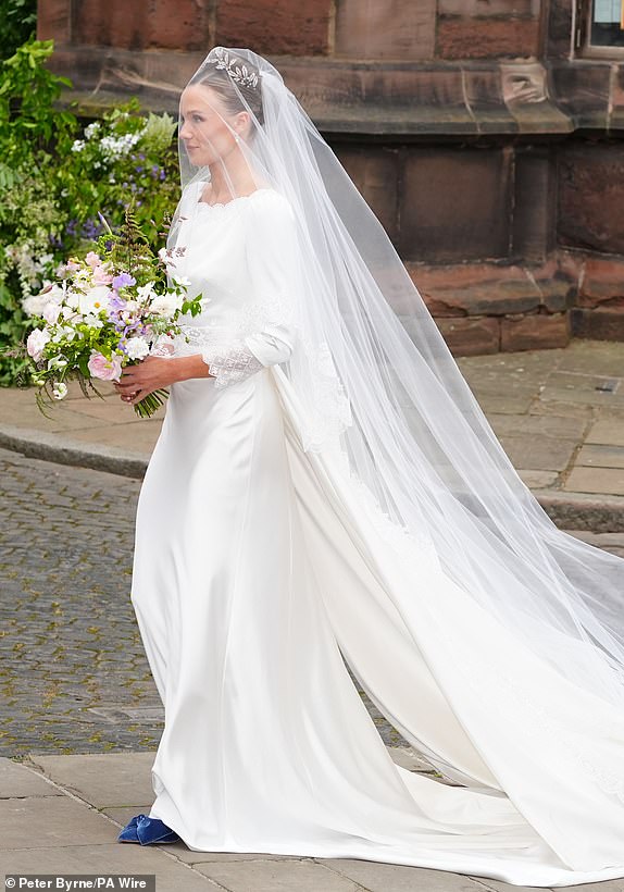 Olivia Henson arrives for her wedding to Hugh Grosvenor, the Duke of Westminster at Chester Cathedral. Picture date: Friday June 7, 2024. PA Photo. The Duke of Westminster is godfather to the Prince of Wales' son, Prince George, and also, reportedly, to the Duke of Sussex's son Prince Archie. See PA story ROYAL Westminster. Photo credit should read: Peter Byrne/PA Wire