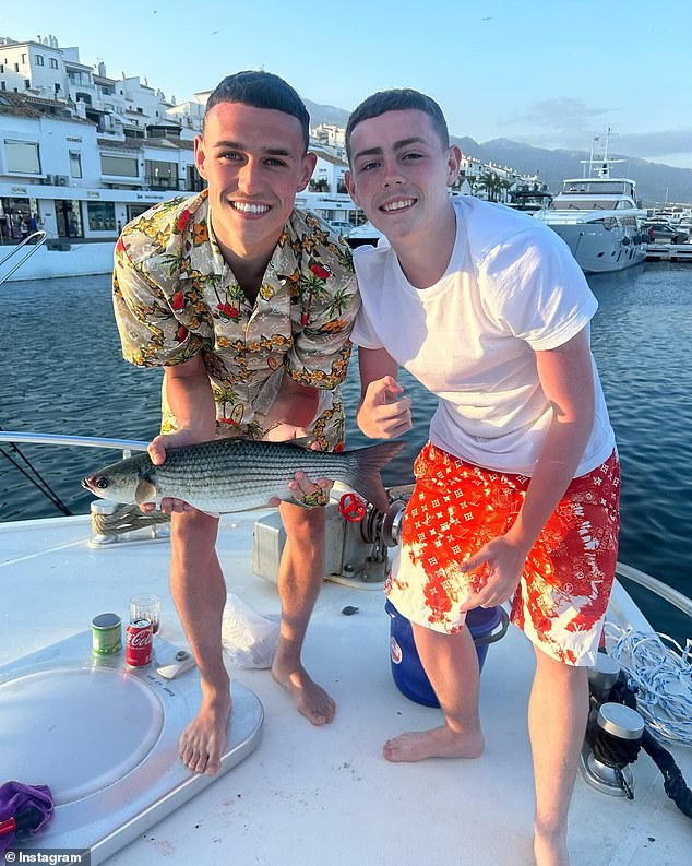 Manchester City Star Phil Foden Reels in Big Catch During Family Getaway in Spain