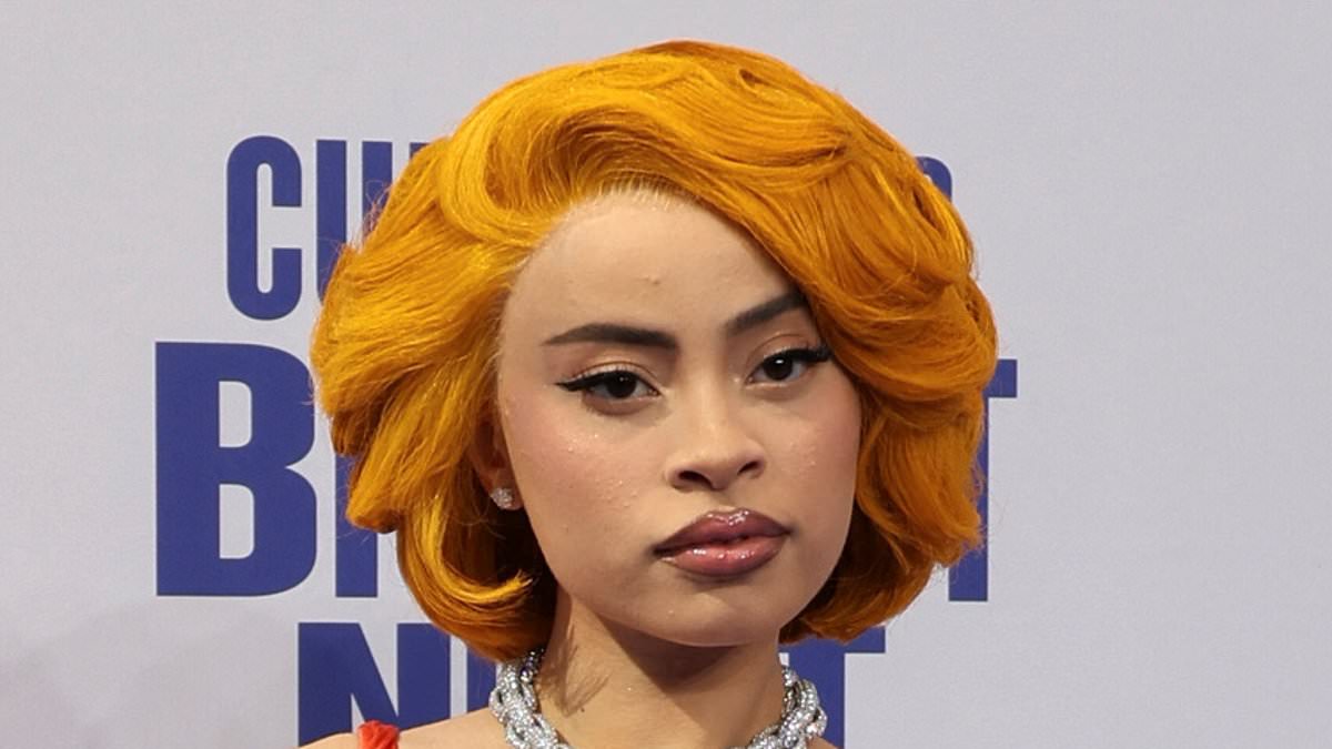 Ice Spice Makes a Stunning Entrance at the 24th Annual BET Awards in Los Angeles with a Bold Orange Gown