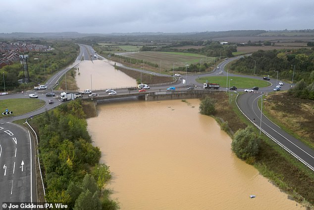 Major Flooding Submerges Vehicles and Forces School Closures Across the Home Counties in England as Two Months’ Worth of Rain Falls in Just 48 Hours