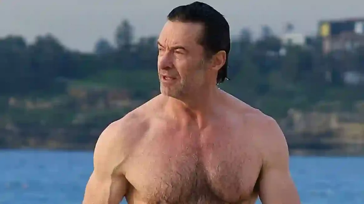 Australian Actor Hugh Jackman Shows Off His Impressive Physique While Taking an Early Morning Swim at Bondi Beach Following an Intense Gym Session