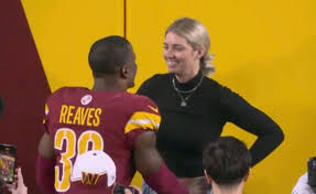 Jeremy Reaves proposes to Mikaela Worley on the field after Washington Commanders secure playoff spot at Northwest Stadium