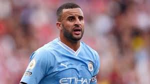 Kyle Walker enjoys a night at the World Darts Championship in London after facing criticism for Manchester City’s poor season and personal controversies