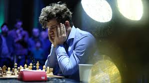 Magnus Carlsen withdraws from the World Rapid and Blitz Chess Championships in New York over dress code dispute