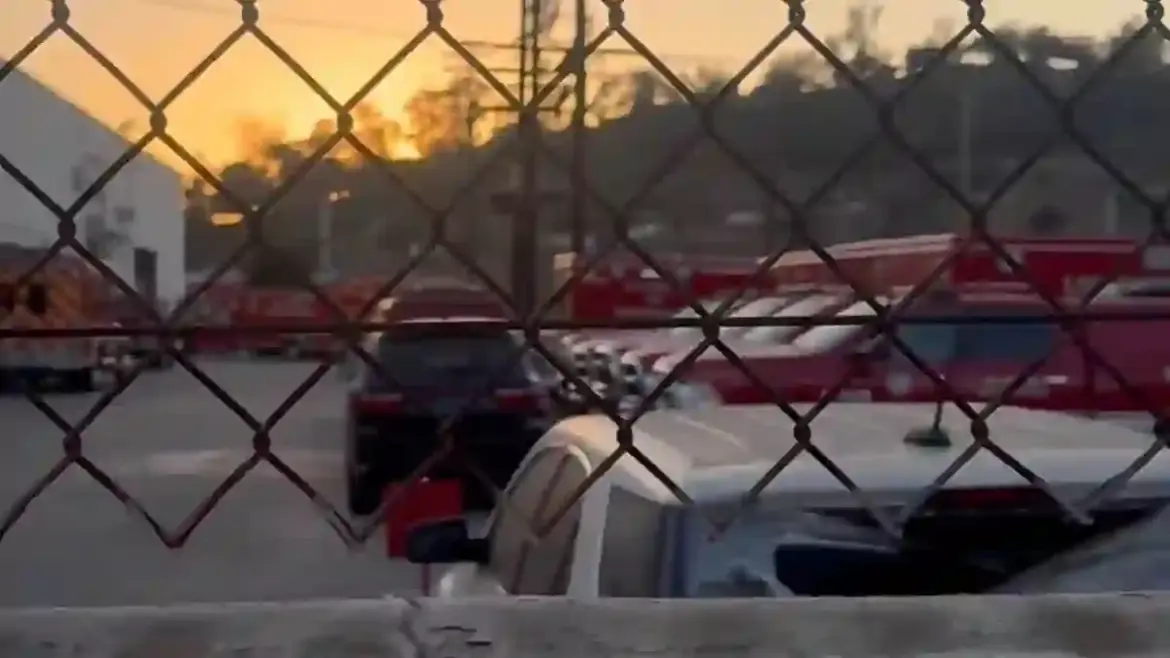 Local activists highlight idle fire trucks in repair lots as Los Angeles confronts devastating wildfire damage