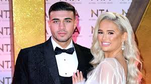 Molly-Mae Hague and Tommy Fury spark reunion rumors after sharing a midnight kiss at a New Year’s Eve party in Cheshire