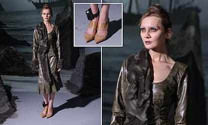 Fake heiress Anna Delvey shocks fashion world as she struts down the runway at New York Fashion Week with ankle monitor on full display