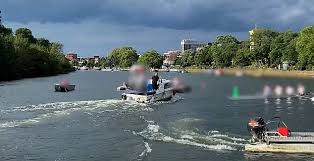 Boater Scott Keen Sparks Chaos on the Thames by Disrupting Rowers at Kingston-upon-Thames Regatta