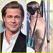 Brad Pitt Reveals Dozens of Tattoos in Rare Shirtless Photo to Promote Upcoming F1 Movie Set to Premiere in June 2025