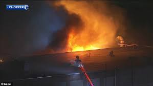 Firefighters Battle Massive Three-Alarm Blaze at Aerospace Supplier Warehouse in Abington Township Pennsylvania as Explosions Erupt Inside