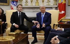 French President Emmanuel Macron and Donald Trump engage in a tense handshake battle during their meeting at the White House