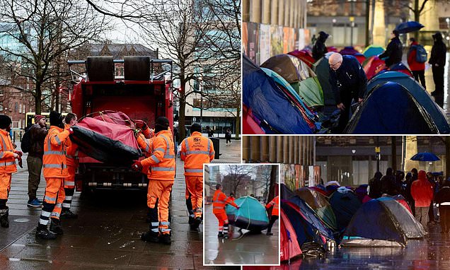 Outrage erupts as authorities in Manchester remove homeless residents from makeshift camp outside town hall with activists protesting forced eviction