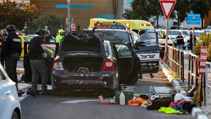 Twelve injured as vehicle plows into pedestrians in suspected terror attack at Karkur junction in northern Israel