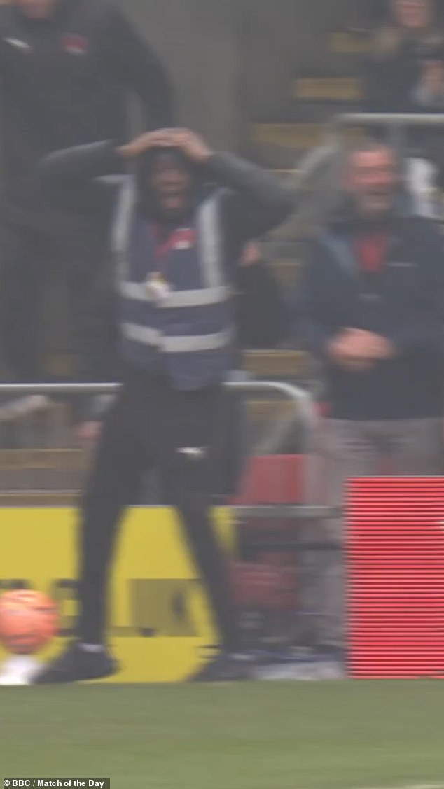 Leyton Orient steward reacts with pure disbelief and joy as Jamie Donley stuns Manchester City with a spectacular halfway-line goal in FA Cup clash at Brisbane Road