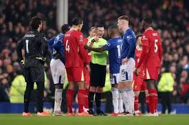 Liverpool’s Conor Bradley Discusses the Impact of Referee Michael Oliver’s Controversial Decisions During Merseyside Derby in Goodison Park