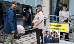 Princess Sofia and Prince Carl Philip celebrate as they leave Danderyds Hospital in Stockholm with their newborn daughter