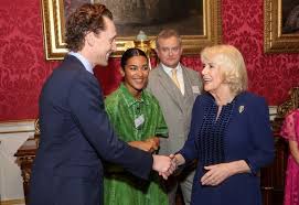 Queen Camilla Hosts BBC 500 Words Writing Competition at Buckingham Palace and Meets Gladiator Nitro in Spangly Costumeb