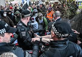 Masked Protesters Clash with Police Outside Reform UK Conference in Cornwall as Tensions Over Far-Right Ideology Escalate