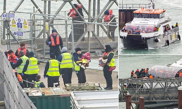 Migrant dies as French Navy rescues 69 people from sinking boat off the coast of Calais during desperate attempt to reach Britain