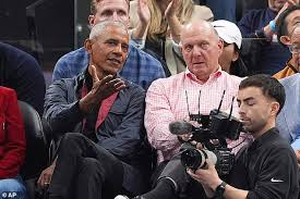 Barack Obama enjoys courtside seats at Los Angeles Clippers game without Michelle amid ongoing marriage speculation