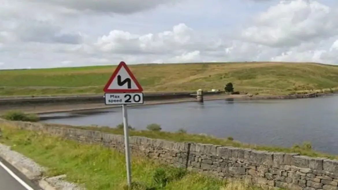 Emergency crews recover bodies of elderly man and woman after their car plunges into water at Huddersfield Road reservoir