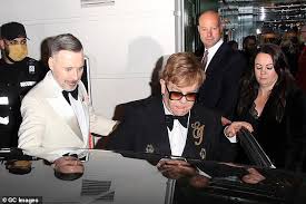 Elton John enjoys front-row seat at the 2025 Oscars while his charity gala continues in West Hollywood