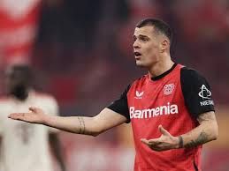 Granit Xhaka Criticizes Referee Michael Oliver for Awarding Bayern Munich Controversial Penalty Against Bayer Leverkusen in Champions League Match in Germany