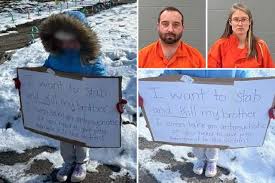 Parents Arrested in Logansport Indiana for Forcing Young Daughter to Stand Outside in Freezing Cold with Abusive Signs