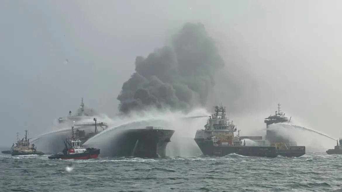 Crew members escape fiery explosion as Portuguese cargo ship crashes into anchored US oil tanker releasing thousands of litres of fuel in the North Sea