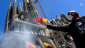 Protesters armed with water pistols confront tourist bus in Barcelona to demand urgent changes to Spain’s overcrowded travel economy