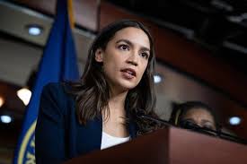 Alexandria Ocasio-Cortez Challenges Tom Homan’s Accusations During Queens Town Hall Over ICE Webinar Controversy
