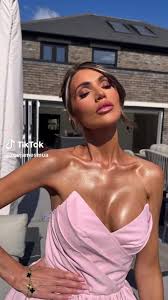 Amy Childs stuns in a pink minidress at home in Essex as fans express concern over her dramatic weight loss journey