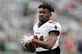 Antonio Brown appears to pull a gun after brawl breaks out at influencer boxing event in Miami
