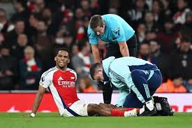 Arsenal defender Jurrien Timber prepares for ankle surgery in London after missing key Premier League matches due to ongoing injury struggles