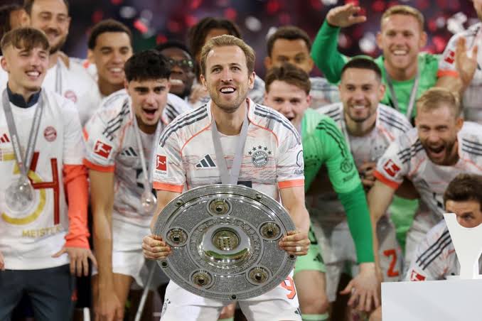 Harry Kane finally wins his first major trophy as Bayern Munich seal Bundesliga title in Germany after dramatic slip-up by Bayer Leverkusen