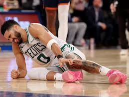 Boston Celtics Star Jayson Tatum Faces Uncertain Future After Suffering Non-Contact Ankle Injury Against Knicks