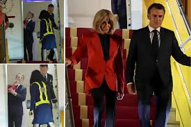 Brigitte Macron surprises onlookers by pushing President Emmanuel Macron’s head during their diplomatic arrival in Hanoi Vietnam