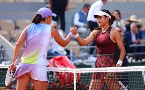 Emma Raducanu Struggles to Overcome Iga Swiatek’s Dominance in Second Round Match at Roland Garros in Paris