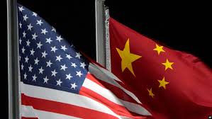 Federal prosecutors charge Chinese and British nationals with stalking a US resident and trafficking military tech from California and Wisconsin