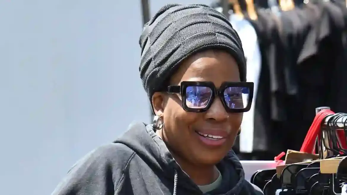 Grammy-winning singer Macy Gray surprises shoppers as she browses clothing racks in casual gear on Melrose Avenue in Los Angeles