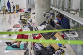 Hundreds of homeless people have turned Madrid-Barajas Airport into a makeshift city as violence drug use and infestations spiral out of control