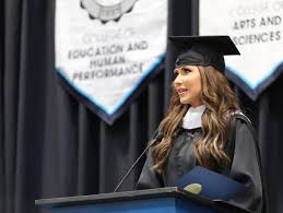 Kristi Noem accepts honorary degree in South Dakota while Priya Saxena earns her doctorate across the state amid immigration battle