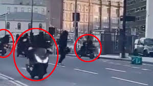 Masked gang ambushes Deliveroo rider and steals his moped in broad daylight outside Birmingham hotel