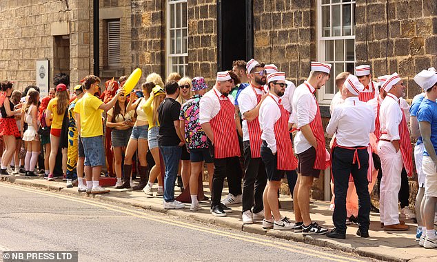 Sun-soaked students parade in fancy dress through West Yorkshire as the Otley Run returns in full force despite looming storm warnings