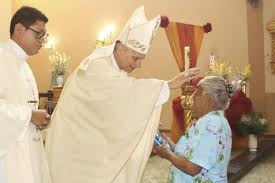 Peruvian woman honors her godfather who became Pope Leo XIV after serving as a humble priest in Chulucanas