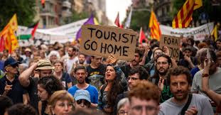 Tourists in Barcelona Protest Against Cruise Ships as Locals Blame Overtourism for Ruining Neighborhood Charm