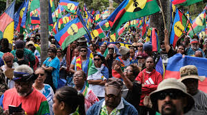 Protesters storm and destroy buildings in New Caledonia as deadly unrest escalates over voting law dispute