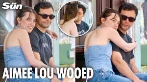 Aimee Lou Wood shares a passionate kiss with co-star Adam Long during cosy coffee date in London as romance rumours heat up on set of BBC’s Film Club