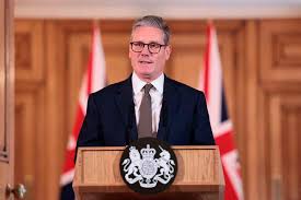 Alexander Downer urges Prime Minister Keir Starmer to bring back scrapped migrant deportation plan in the United Kingdom